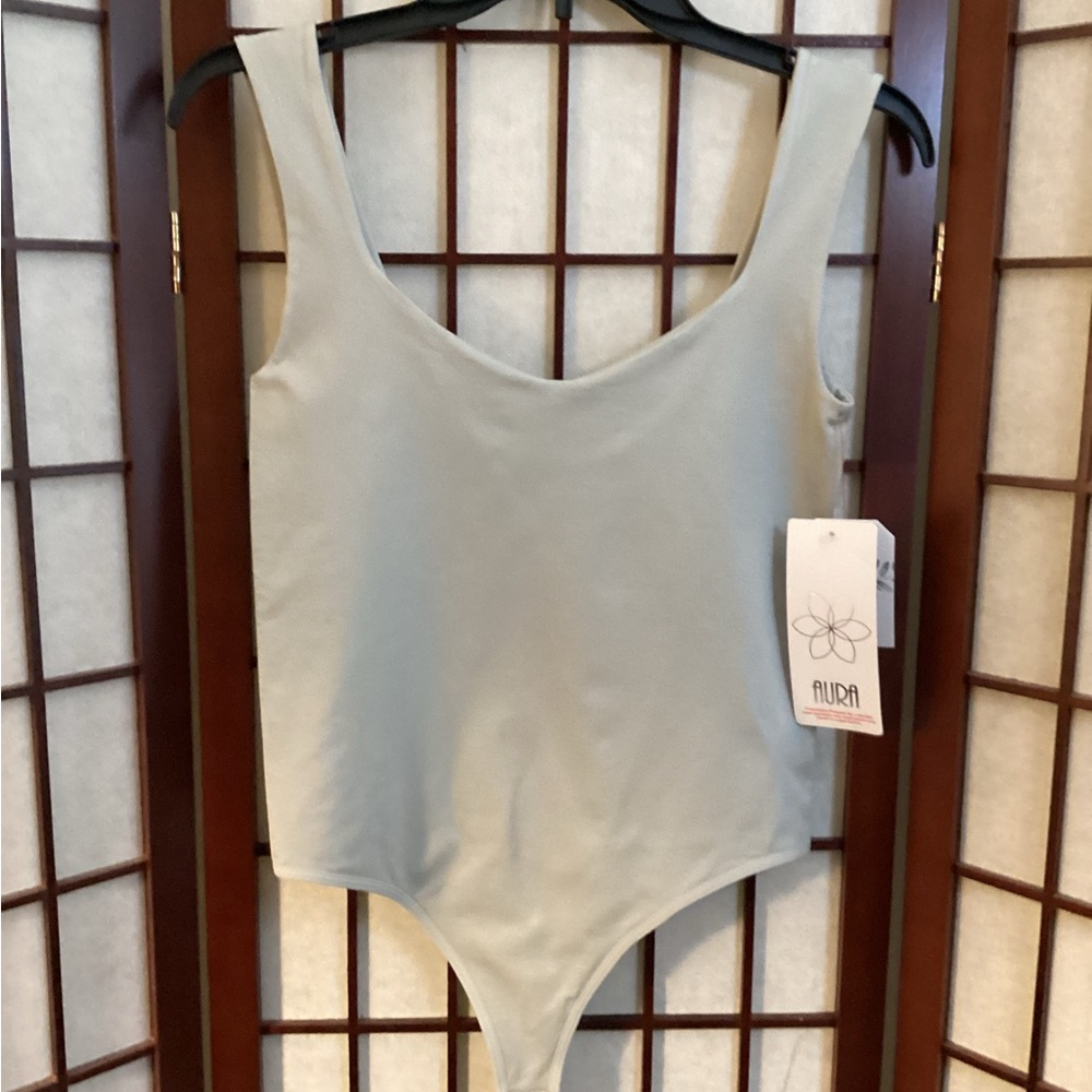 Aura Soft Cream Greige Bodysuit
Size L/XL